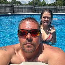 What are some recommendations for things to do in Greenville, SC, for a  visitor who enjoys good food, craft beer, hiking, and sports bars?