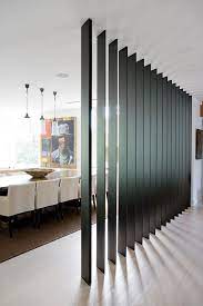 The gap between the slats allows for light and air to pass through making it a lighter way to partition off an area than a solid wall. Interior Partitions Room Zoning Design Ideas