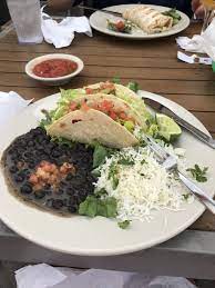 Mild, flaky fish deliciously seasoned with spices, flash fried, served in creamy lime sauce with jack cheese, shredded cabbage, citrus dressing and pico de gallo on taco shell of your. Closed Cactus Flower Cafe Gulf Breeze Florida Restaurant Happycow