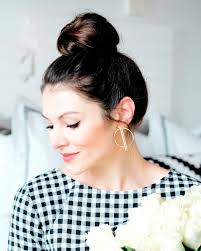 The topknot is many things; Easy 2 Minute Topknot Tutorial Me And Mr Jones