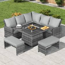 In addition, the two benches that face each other on either side of the fire pit are fixed and built in as well. Cambridge Corner Rattan Dining Set With Firepit Table Grey Kobocrete
