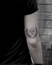 40 Small Tattoo Designs And Ideas For Men Buzz Hippy Small Tattoos For Guys Tattoo Designs Men Arm Tattoos For Guys