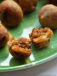 Kobbari Poornam Boorelu Recipe Andhra Coconut Poornalu Recipe Recipe Jaggery Recipes Sweet Recipes Recipes