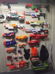 Sheet of pegboard (size will vary based on your needs) spray paint; Diy Nerf Gun Rack Nurf Gun Racks For Wall Amazon Com Nerf Elite Blaster This Homemade Nerf Gun Will Solve The Problem Of Office Bullies Who Made Fun