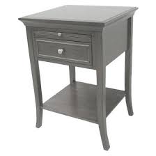 The three wooden tabletops are connected by a slider mechanism, that allows the three parts to be moved in many configurations. Threshold Simply Extraordinary Grey Side Table