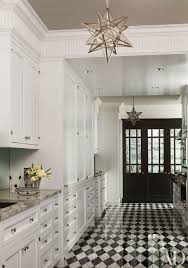 Kitchen floor tiles are not only used in our homes but are also used commercially in industries and restaurants. 9 Beautiful Black And White Kitchens From The Ad Archives Architectural Digest