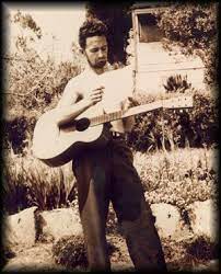 Woody Guthrie With His 000 Auditorium Sized Martin Guitar In California American Folk Music Best Guitar Players Music Photo