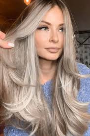 Looking for a good hair stylist that can do this to brown hair that has  some highlights!