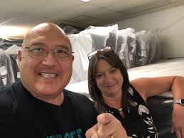 Took plastic off less than month and a half ago. Moving no room for it.  Awesome bed totally spotless I have a new king size mattress pad/cover over  it and comes with