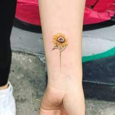 Popular places for sunflower tattoos 3. Sunflower Tattoo On The Inner Forearm