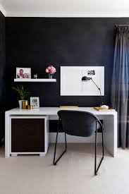 White curtains complemented with black greek key trim accent black french doors opening to a home office style with white accent chairs placed on a this chic black and white workspace boasts a white lacquered dresser contrasted with black drawers and illuminated by gold lamps black on either. 30 Black And White Home Offices That Leave You Spellbound