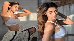Too HOT! Disha Patani slips into a white bralette and flaunts her  super-toned physique | Telugu Movie News - Times of India
