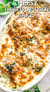 Cheesy Chicken Spinach Bake Deliciously Baked Chicken Topped With Creamy Spinach And Melty Cheese Sup Chicken Spinach Bake Spinach Bake Easy Spinach Recipes