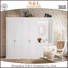 Not only does it help maintain a sense of cohesion in the master suite, it's also a seamless fit in a whimsical toddler room. China Custom Bedroom Wardrobe Designs White Wooden Bedroom Furniture Wardrobe With Open Doors China Wardrobe Bedroom Furniture Wardrobe