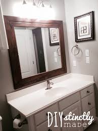 This will hold the mirror in place. Diy Easy Framed Mirrors Diystinctly Made