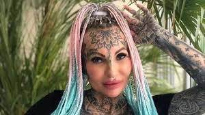 Mum covers her body in tattoos after ditching husband who hated ink