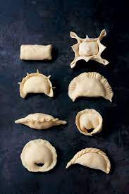 Add the flour, salt, sugar (if using), and baking powder in a food processor. Empanada Dough Recipe Sbs Food