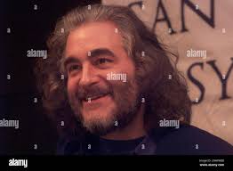 SYMPHONY07 2/C/06JAN99/DD/MAC The members of the rock group Metallica with  join with composer Michael Kamen and the San Francisco Orchestra for a  performance in April. Kamen joined Metallica at a news coference