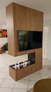 Creation D Une Cloison Centrale Pour Delimiter Les Differents Espaces De Vie Sur Celle Ci S Y Modern Master Bathroom Wall Tv Unit Design Tv Stand Room Divider