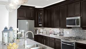 Bold, dark and warm, espresso maple cabinet finish is as brown as a fresh coffee bean. Tahoe Timberlake