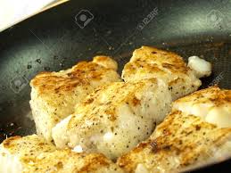 Maybe you would like to learn more about one of these? Someone Frying Seasoned White Fish In A Frying Pan Stock Photo Picture And Royalty Free Image Image 13073697