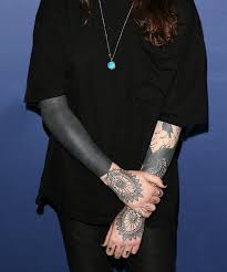 All Black Arm Sleeve Tattoo The Internet Is Obsessed With This Blackout Tattoo Technique Blackout Tattoo All Black Tattoos Tattoos