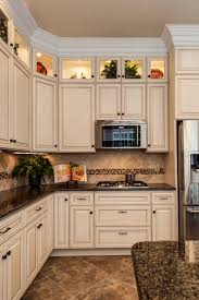 Kitchen backsplash ideas with white cabinets and dark from brown and white backsplash, image by:ahhualongganggou.com granite countertop white pantry cabinets for modern white and brown kitchen cabinets probably quite a few discussions about brown and white backsplash, if the. Tropical Brown Granite White Cabinets Ideas Photos Houzz