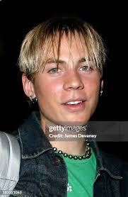 Avril Lavigne's guitarist Evan Taubenfeld during David Schwimmer and...  News Photo