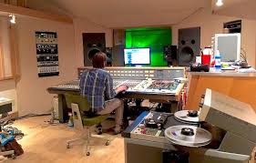 A music producer's job can be as passive as sitting on the couch listening and nodding approval and as active as running a soundboard and helping to place microphones in drum sets, or even participate as a musician on some tracks. Cool Careers In Music Production