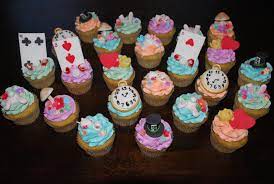 Behold, the easiest fancy cake you'll ever make! Alice In Wonderland Cupcakes These Were Banana Cake With Coconut Cream Buttercream And Handmade Fondant Decorations Cakecentral Com