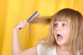 Under the flowing, golden waves lay a cluster of knots and tangles. Knotty Hair Today S Parent