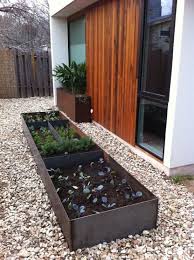 It offers perfect drainage, protection from pests, and easy access to crops. Modern Garden Modern Garden Modern Garden Design Garden Design