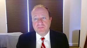 Colorado Gov. Polis defends starting to reopen