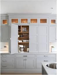 Hidden Storage The Convenient Way To Organize Ateliers Jacob Calgary Floor To Ceiling Cabinets Kitchen Wall Cabinets New Kitchen Cabinets