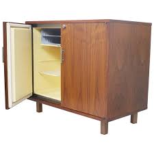 Beautiful, two piece liquor cabinet. Vintage 1960 S Mid Century Modern Walnut Mini Bar Fridge Liquor Cabinet At 1stdibs