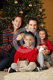 Family In Front Of Christmas Tree Christmas Family Photoshoot Family Christmas Pictures Christmas Family Photos