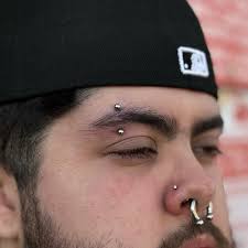 Re-pierced Snake bites and then added an eyebrow for this client 👌🏻