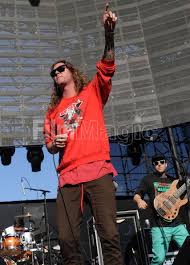 Jared Watson and David Foral of The Dirty Heads performs during the...