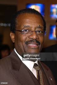 News crews attempt to speak with Randy McMurray, an attorney at The... News  Photo