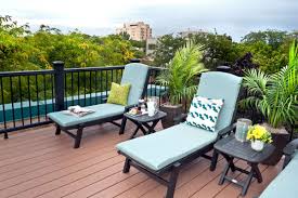 Using rattan furniture, rugs, and lots of greenery you can give your deck a bohemian inspired look that is easy to keep clean and comfortable. Rooftop Deck Ideas Trex