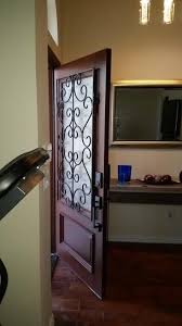 steves sons 36 in x 80 in decorative iron grille 3 4 lite stained mahogany wood prehung front door m6201rc ct mj 4rh the home depot in 2021 wrought iron doors wrought iron front