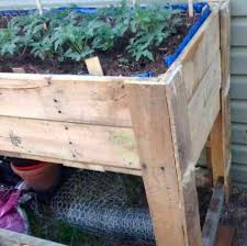 While the first pallet bed was smaller, for things like strawberries, this type of bed can give you more space and depth for larger plants. Diy Raised Garden Bed Using Pallets Amanda Seghetti