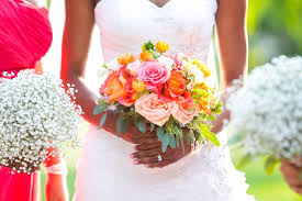 A single rose is enough to make us swoon, but where do you start when it's time to pick roses for your wedding day bouquet? Pink And Coral Rose Bouquet