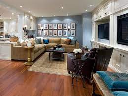 Ideas that help you turn a raw space into a livable one. 10 Chic Basements By Candice Olson Rooms Home Garden Television Love The Art Display Use In Basement Makeover Basement Decor Finished Basement Designs