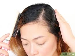 In order to fake bangs using a bun, your hair needs to be long enough to be put up into a high ponytail, to be draped over the top of your head, and to cover your forehead. 3 Ways To Make A Side Fringe Without Cutting Your Hair Wikihow