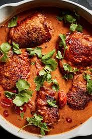One Pot Braised Chicken With Coconut Milk Tomato And Ginger Recipe Recipe Ginger Recipes Nyt Cooking Braised Chicken