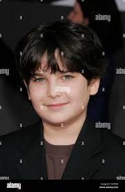 Actor Spencer Fox, who is the voice of the character, 'Dash Parr', poses  for photographers at the premiere of the new animated film from Pixar, 'The  Incredibles' at the El Capitan Theatre