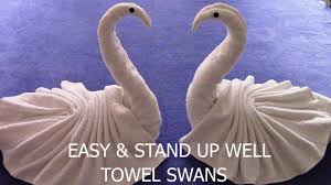 How to fold a bath towel. How To Make A Towel Swan That Stands Up Well Towel Art Towel Origami Towel Animal Swan Folding Youtube