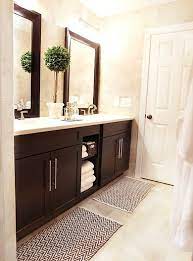 Pairing contrasting cabinets and countertops can create a contemporary kitchen look. Love The Dark Wood Of The Cabinets Hall Bathroom Bathrooms Remodel Beautiful Bathrooms