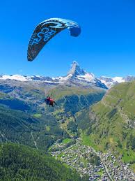 paragliding in switzerland paragliding amazing travel destinations parasailing